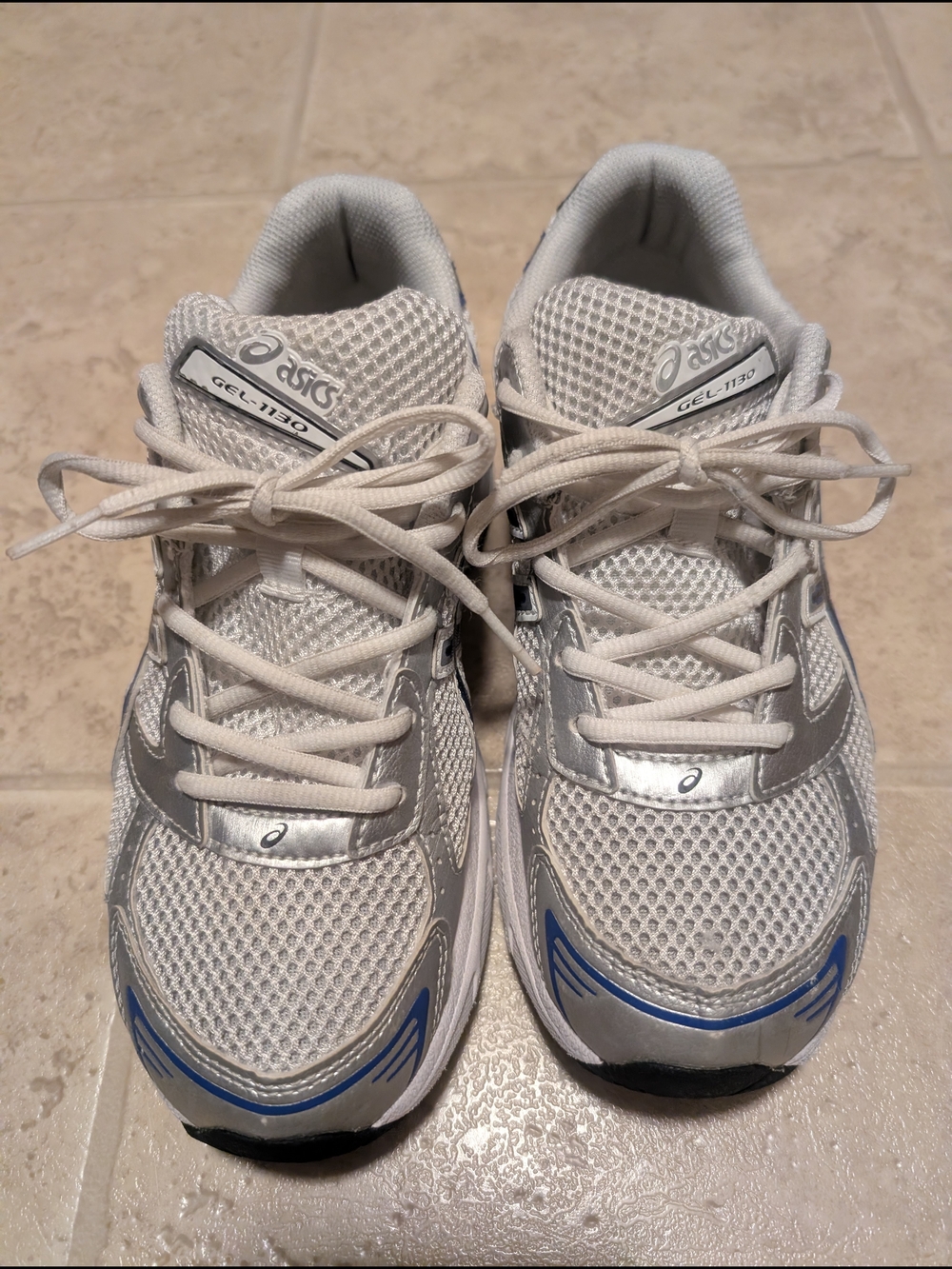 ASICS GEL-1130 Athletic Sneakers in White and Silver with Blue Accent